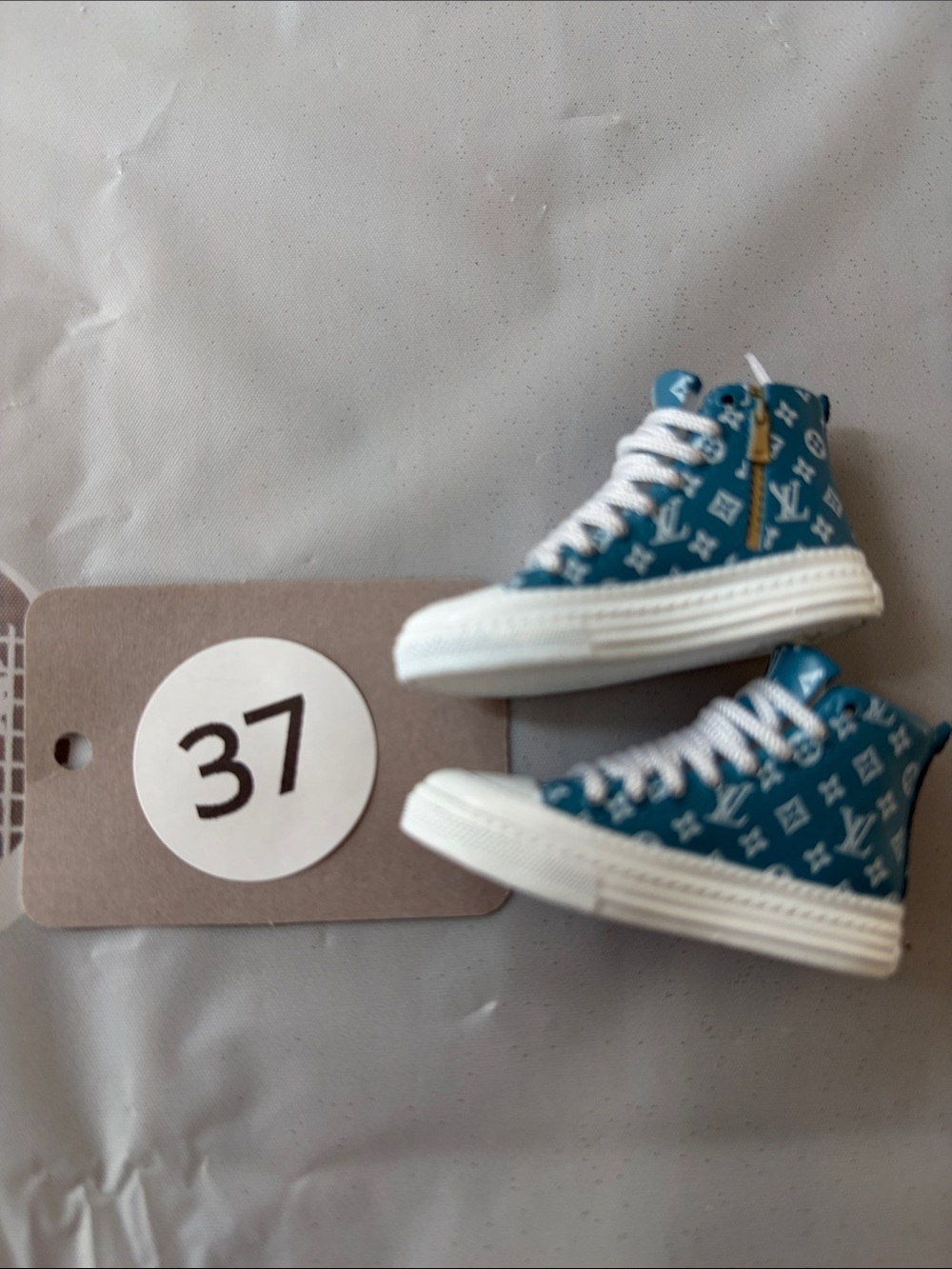 LV37, High-Top Mini LV Logo Sneakers in Teal with White Laces